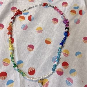 Rainbow beaded mushroom pride necklace